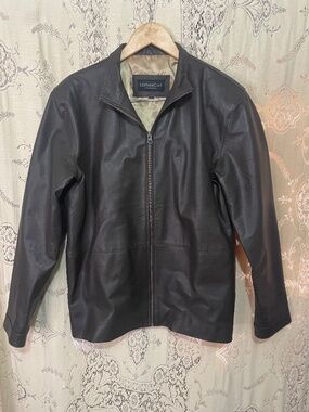 Leather cult: dark brown leather jacket with gold lining
